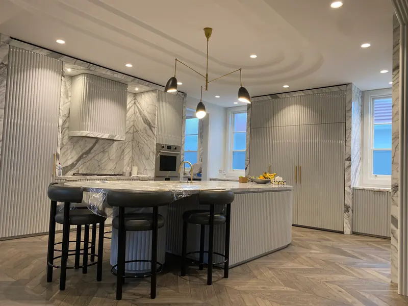 Marble kitchen with pendant lighting installed by D&D Electrical South Coast