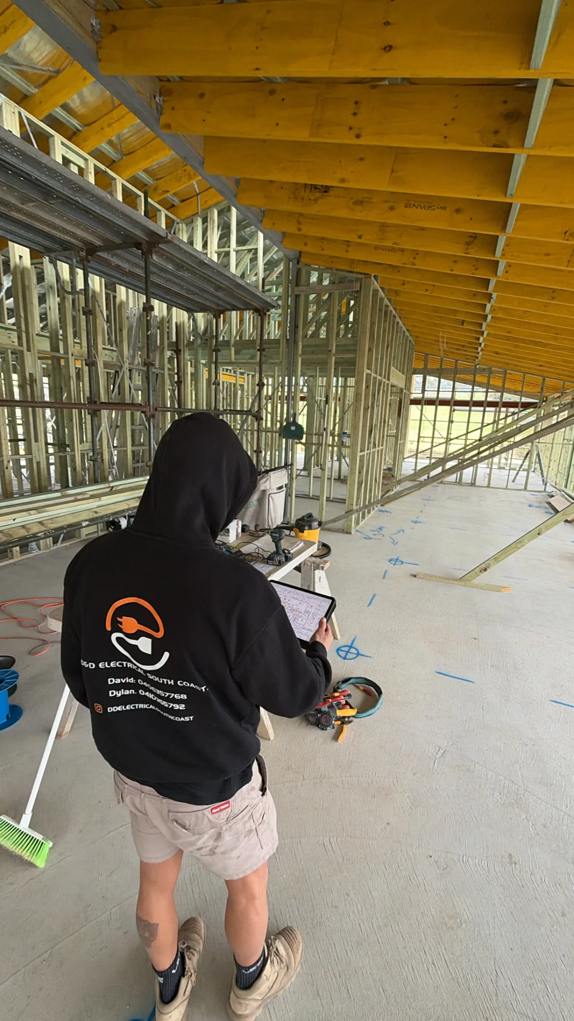 D&D Electrical team member on the job